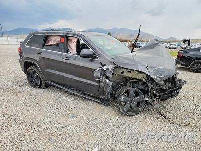 Czwarte zdjęcie samochodu z boku: 2015 JEEP GRAND CHEROKEE LAREDO VIN:1C4RJFAG4FC712859 - miniatura