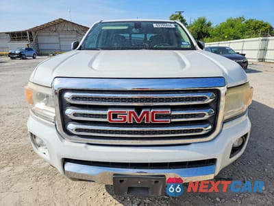 Piąte zdjęcie samochodu w środku: 2016 GMC CANYON SLT VIN:1GTG5DE31G1350512 - miniatura
