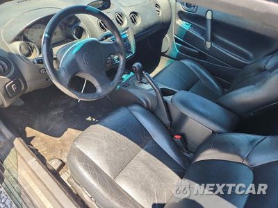 Zdjęcie 8 z 12 samochodu: 2001 MITSUBISHI ECLIPSE SPYDER GT VIN:4A3AE55H71E004114 - miniatura