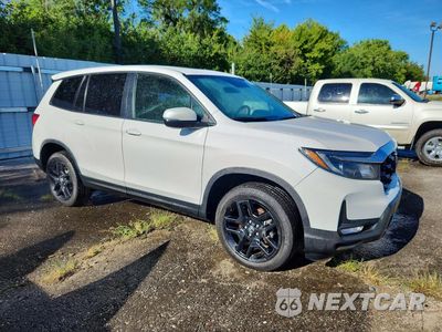 Czwarte zdjęcie samochodu z boku: 2024 HONDA PASSPORT EXL VIN:5FNYF8H58RB010080 - miniatura