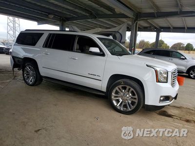 Czwarte zdjęcie samochodu z boku: 2017 GMC YUKON XL K1500 SLT VIN:1GKS2GKC4HR217999 - miniatura