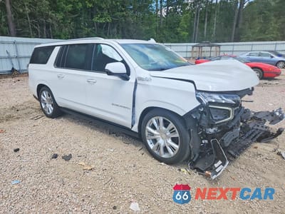 Czwarte zdjęcie samochodu z boku: 2024 CHEVROLET SUBURBAN K1500 HIGH COUNTRY VIN:1GNSKGKL0RR180048 - miniatura