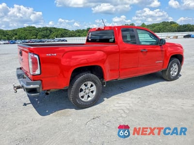 Trzecie zdjęcie samochodu z tyłu: 2018 GMC CANYON VIN:1GTH6BEN2J1170938 - miniatura