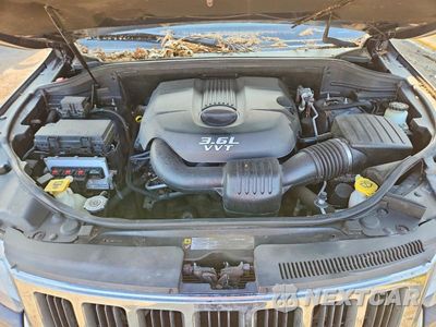 Zdjęcie 12 z 13 samochodu: 2012 JEEP GRAND CHEROKEE LAREDO VIN:1C4RJFAG3CC233313 - miniatura
