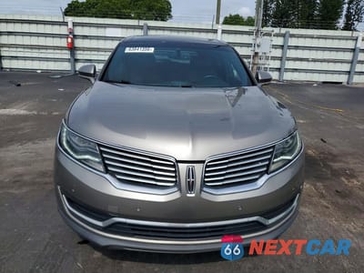 Piąte zdjęcie samochodu w środku: 2016 LINCOLN MKX RESERVE VIN:2LMPJ6LP6GBL22142 - miniatura