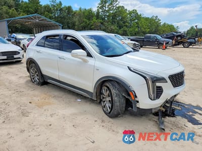 Czwarte zdjęcie samochodu z boku: 2019 CADILLAC XT4 PREMIUM LUXURY VIN:1GYFZCR43KF157426 - miniatura