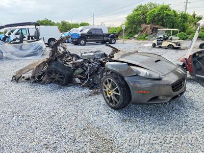 Czwarte zdjęcie samochodu z boku: 2012 FERRARI CALIFORNIA VIN:ZFF65LJA6C0182555 - miniatura