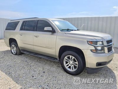 Czwarte zdjęcie samochodu z boku: 2015 CHEVROLET SUBURBAN C1500 LT VIN:1GNSCJKC8FR555142 - miniatura