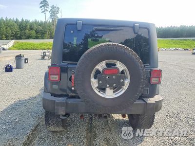 Zdjęcie 6 z 12 samochodu: 2013 JEEP WRANGLER UNLIMITED SPORT VIN:1C4BJWDG7DL618503 - miniatura