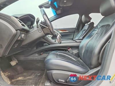 Zdjęcie 7 z 12 samochodu: 2017 LINCOLN MKZ RESERVE VIN:3LN6L5EC0HR657437 - miniatura