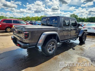 Trzecie zdjęcie samochodu z tyłu: 2021 JEEP GLADIATOR RUBICON VIN:1C6JJTBG4ML618298 - miniatura