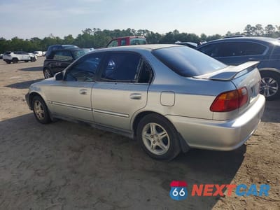 Drugie zdjęcie samochodu z przodu: 1999 HONDA CIVIC LX VIN:1HGEJ6672XL014454 - miniatura