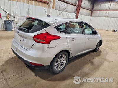 Trzecie zdjęcie samochodu z tyłu: 2018 FORD FOCUS SE VIN:1FADP3K21JL262502 - miniatura