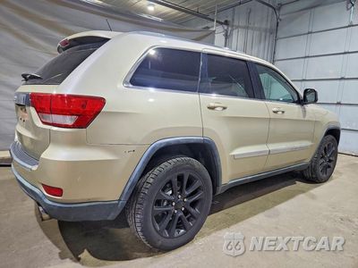 Trzecie zdjęcie samochodu z tyłu: 2011 JEEP GRAND CHEROKEE LAREDO VIN:1J4RR4GG3BC562588 - miniatura