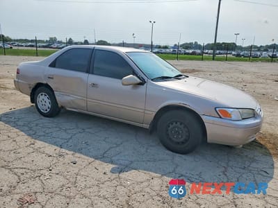 Czwarte zdjęcie samochodu z boku: 1999 TOYOTA CAMRY LE VIN:4T1BG22K9XU484313 - miniatura