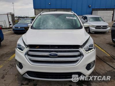 Piąte zdjęcie samochodu w środku: 2017 FORD ESCAPE TITANIUM VIN:1FMCU0JD9HUD74660 - miniatura