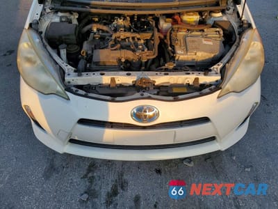 Zdjęcie 11 z 12 samochodu: 2012 TOYOTA PRIUS C THREE VIN:JTDKDTB31C1508854 - miniatura