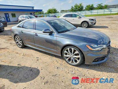 Czwarte zdjęcie samochodu z boku: 2014 AUDI A6 PRESTIGE VIN:WAUHGAFC1EN125523 - miniatura