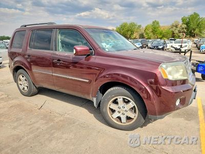 Czwarte zdjęcie samochodu z boku: 2009 HONDA PILOT TOURING VIN:5FNYF489X9B019259 - miniatura