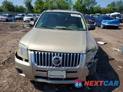 Piąte zdjęcie samochodu w środku: 2011 MERCURY MARINER VIN:4M2CN8B75BKJ01558 - miniatura