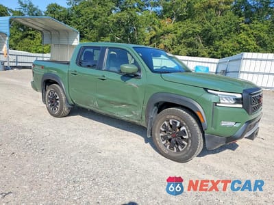 Czwarte zdjęcie samochodu z boku: 2023 NISSAN FRONTIER PRO-X VIN:1N6ED1EJXPN614968 - miniatura