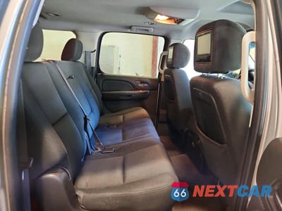 Zdjęcie 11 z 13 samochodu: 2012 CHEVROLET SUBURBAN K1500 LS VIN:1GNSKHE70CR246724 - miniatura