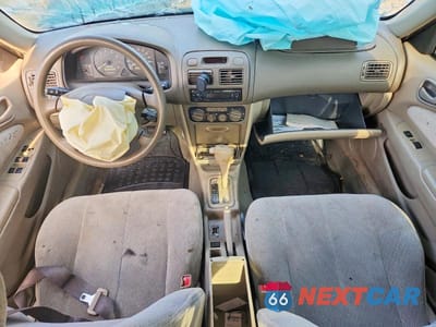 Zdjęcie 8 z 13 samochodu: 2001 TOYOTA COROLLA LE VIN:1NXBR12E41Z536405 - miniatura