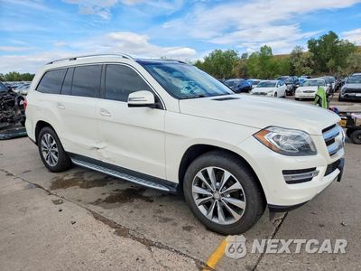 Czwarte zdjęcie samochodu z boku: 2016 MERCEDES-BENZ GL 450 4MATIC VIN:4JGDF6EE6GA682437 - miniatura