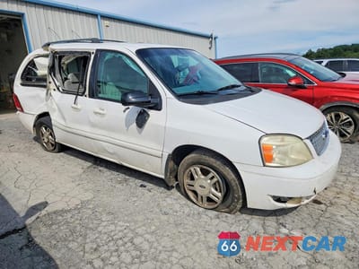 Czwarte zdjęcie samochodu z boku: 2006 FORD FREESTAR SEL VIN:2FMDA52246BA13797 - miniatura