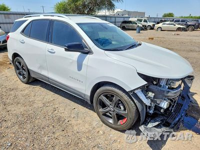 Czwarte zdjęcie samochodu z boku: 2021 CHEVROLET EQUINOX PREMIER VIN:2GNAXNEV0M6131810 - miniatura