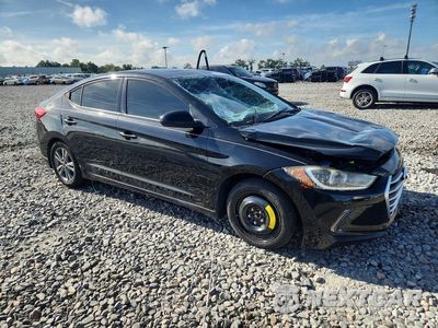 Czwarte zdjęcie samochodu z boku: 2018 HYUNDAI ELANTRA VALUE EDITION VIN:5NPD84LF3JH360854 - miniatura