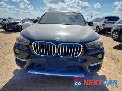 Piąte zdjęcie samochodu w środku: 2017 BMW X1 SDRIVE28I VIN:WBXHU7C35H5H34790 - miniatura