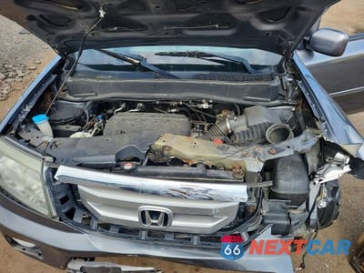 Zdjęcie 12 z 14 samochodu: 2011 HONDA PILOT EXL VIN:5FNYF4H53BB104866 - miniatura