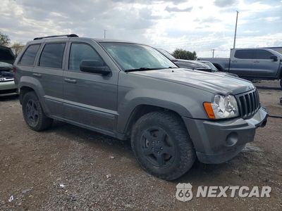 Czwarte zdjęcie samochodu z boku: 2007 JEEP GRAND CHEROKEE LAREDO VIN:1J8GR48K97C563938 - miniatura