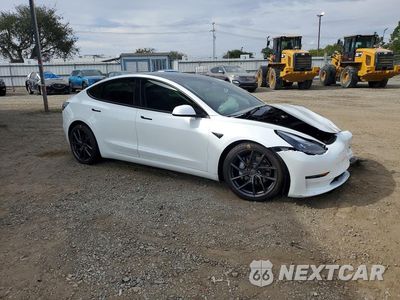 Czwarte zdjęcie samochodu z boku: 2022 TESLA MODEL 3 VIN:5YJ3E1EB4NF341344 - miniatura