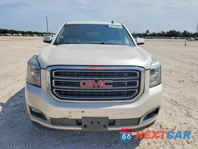 Piąte zdjęcie samochodu w środku: 2015 GMC YUKON C1500 SLT VIN:1GKS1HKC0FR163364 - miniatura