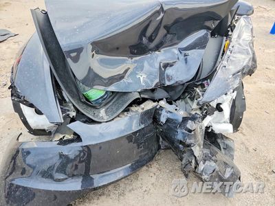 Zdjęcie 11 z 12 samochodu: 2024 TESLA MODEL 3 VIN:5YJ3E1EA0RF872571 - miniatura