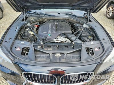 Zdjęcie 11 z 12 samochodu: 2014 BMW 740 LXI VIN:WBAYF4C56ED282108 - miniatura