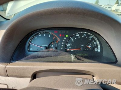Zdjęcie 9 z 12 samochodu: 2004 TOYOTA CAMRY LE VIN:JTDBE32K240264269 - miniatura