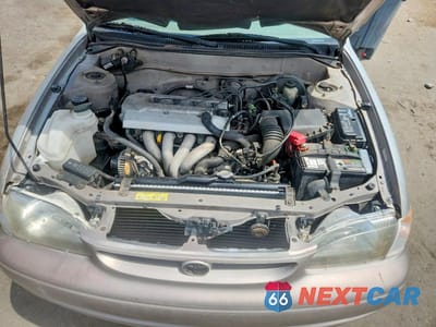Zdjęcie 11 z 13 samochodu: 1999 TOYOTA COROLLA VE VIN:1NXBR12E2XZ287868 - miniatura