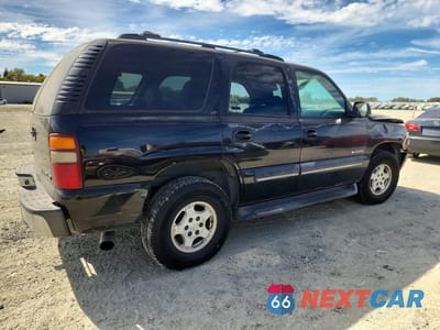 Trzecie zdjęcie samochodu z tyłu: 2001 CHEVROLET TAHOE C1500 VIN:1GNEC13T81J125436 - miniatura