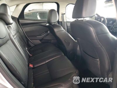 Zdjęcie 10 z 12 samochodu: 2013 FORD FOCUS TITANIUM VIN:1FADP3J27DL252062 - miniatura