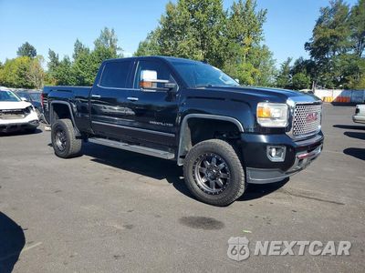 Czwarte zdjęcie samochodu z boku: 2015 GMC SIERRA K2500 DENALI VIN:1GT120E87FF671278 - miniatura