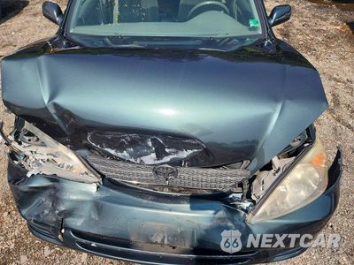 Zdjęcie 11 z 12 samochodu: 2002 TOYOTA CAMRY XLE VIN:4T1BE30K52U527391 - miniatura