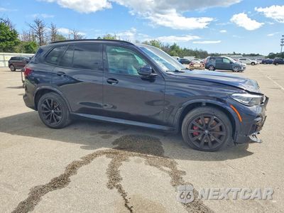 Czwarte zdjęcie samochodu z boku: 2022 BMW X5 M50I VIN:5UXJU4C0XN9M10740 - miniatura
