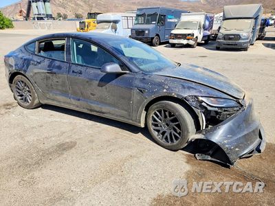 Czwarte zdjęcie samochodu z boku: 2024 TESLA MODEL 3 VIN:5YJ3E1EA1RF745408 - miniatura