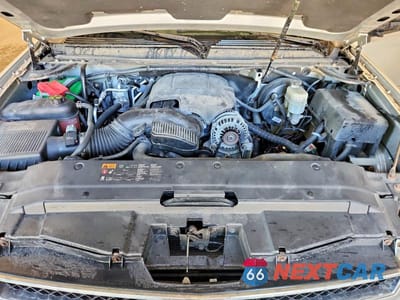Zdjęcie 12 z 13 samochodu: 2012 CHEVROLET SUBURBAN K1500 LS VIN:1GNSKHE70CR246724 - miniatura