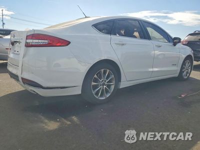 Trzecie zdjęcie samochodu z tyłu: 2017 FORD FUSION SE HYBRID VIN:3FA6P0LU9HR344500 - miniatura