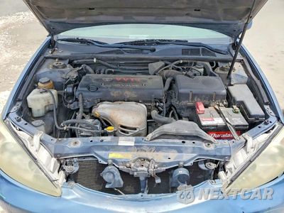 Zdjęcie 12 z 13 samochodu: 2002 TOYOTA CAMRY LE VIN:4T1BE32K72U511397 - miniatura