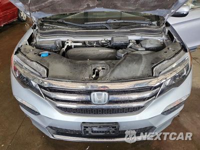 Zdjęcie 12 z 13 samochodu: 2018 HONDA PILOT ELITE VIN:5FNYF6H04JB007299 - miniatura